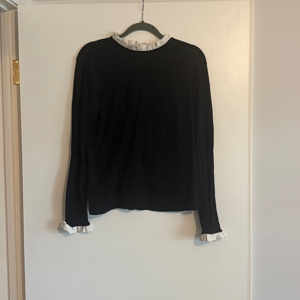 Ann Taylor Black Top with Cream Ruffle Trim at neck and sleeves.